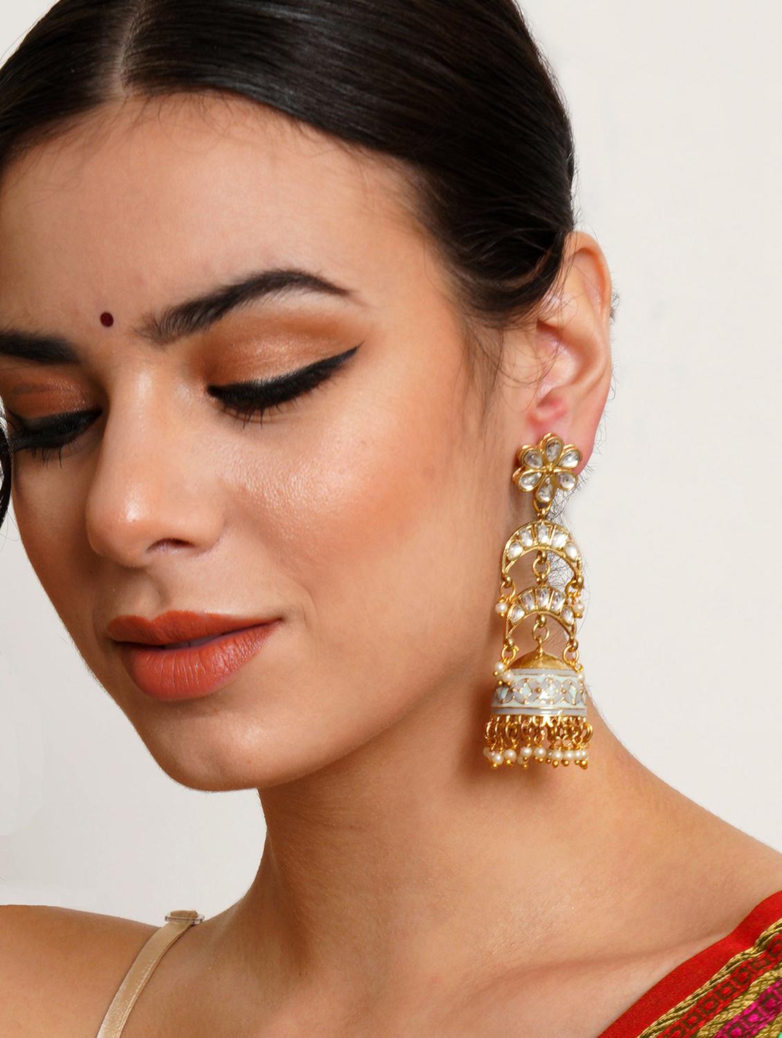 gold toned and white classic jhumkas earrings - 18633231 - Zoom Image - 3